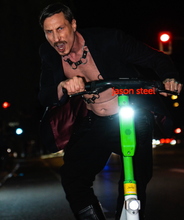 Jason presenting art at here&now exhibition in motion