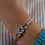 Thumbnail: Triple Blue Topaz Latching Cuff-on model
