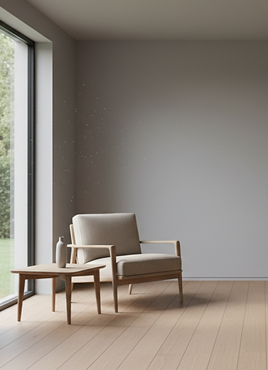 Minimalist Interior Space with Armchair and Natural Light.png