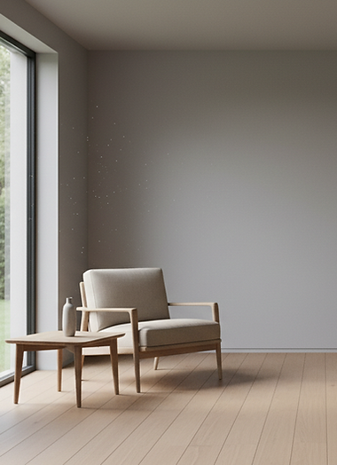 Minimalist Interior Space with Armchair and Natural Light.png