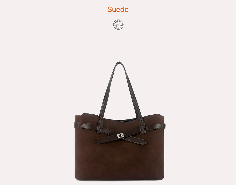 Thumbnail: Chocolate brown tote bag with long shoulder handles, crossed belt detail, and a metal turn-lock accent on the front.