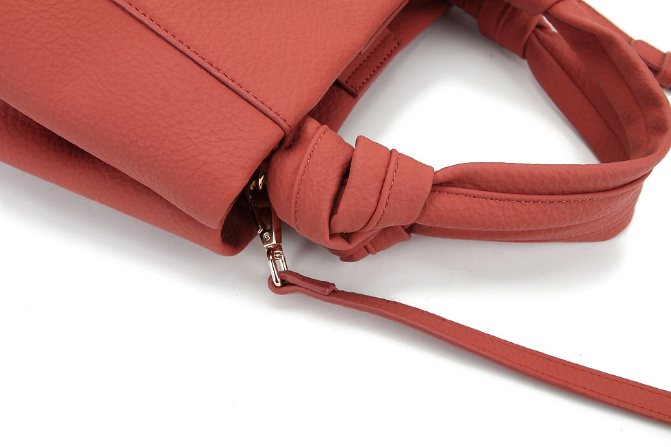 Thumbnail: Red recycled water base vegan leather polyurethane PU crossbody bag detail view