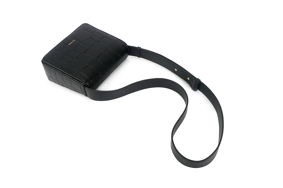 Thumbnail: Small black croc-embossed crossbody bag with an adjustable strap and subtle AUTRON logo on the front.