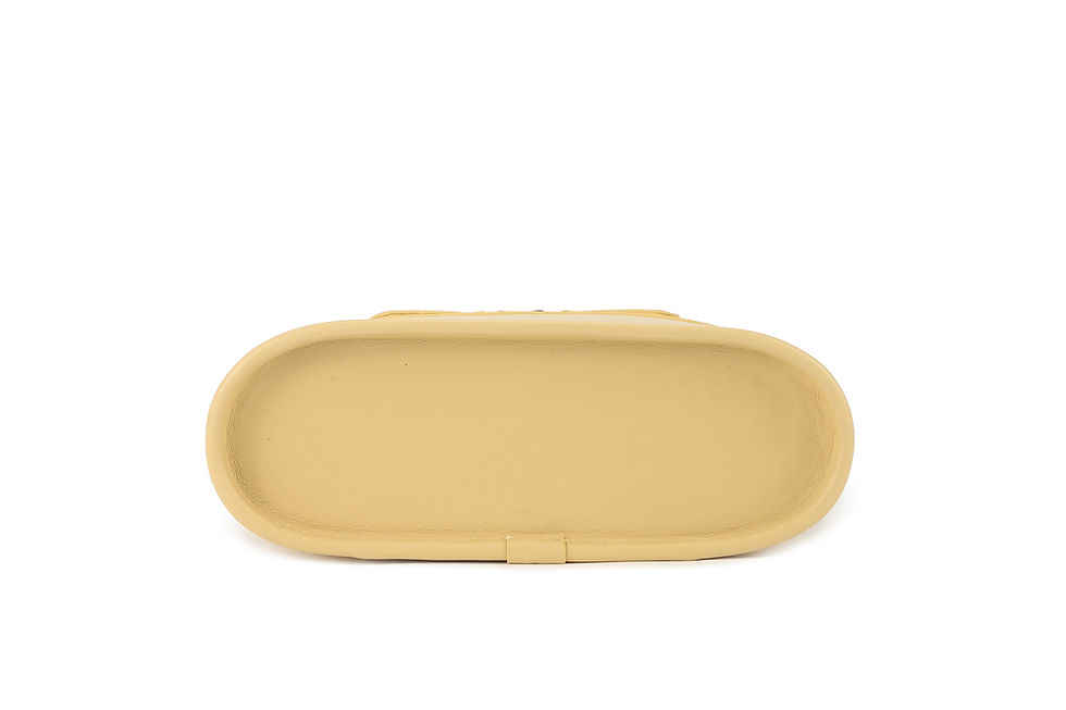 Thumbnail: Pale yellow structured vanity bag with top handle, double zipper pullers, detachable strap, and gold-tone hardware.
