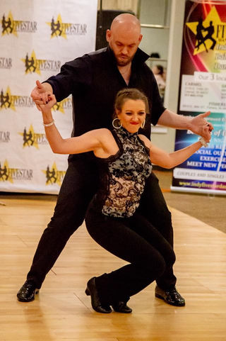 Ballroom Dancers Dancing at Five Star Dance Studios