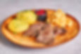 Smoked reindeer meat with vegatables.