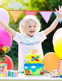 kids-birthday-party-child-blowing-out-cake-candle-picture-id1079799694.jpeg
