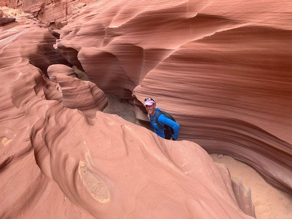 Off the Beaten Path in the Southwest: Oren negotiating the tightest slot canyon