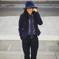 A fashion image of a model in the street of London