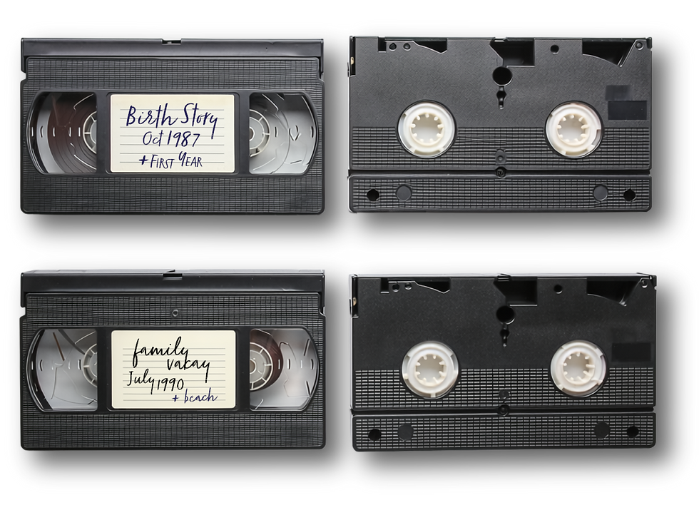 VHS tapes labeled 'Birth Story' and 'family outing'