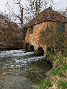 View of Eel House from river bank