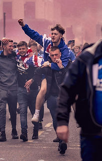 3 premio. Every joy_I was walking home when I encountered a football march celebrating a w