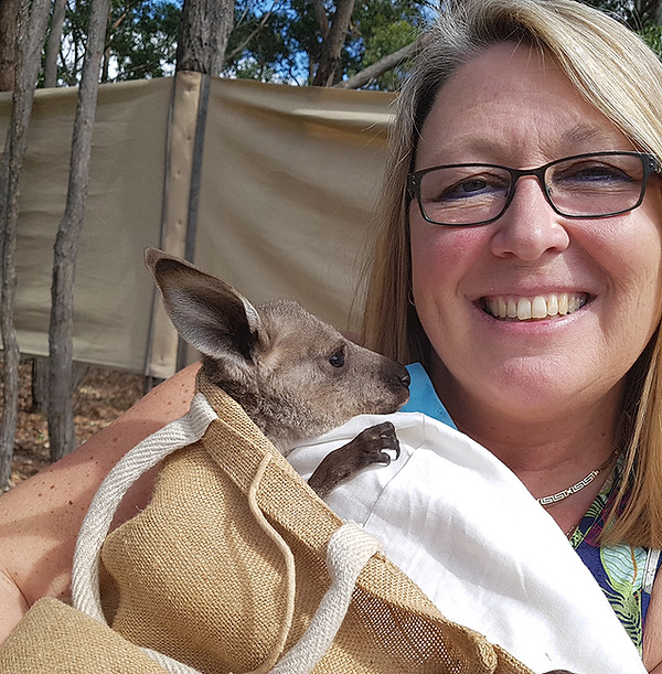 Elaine Price with a baby kangaroo