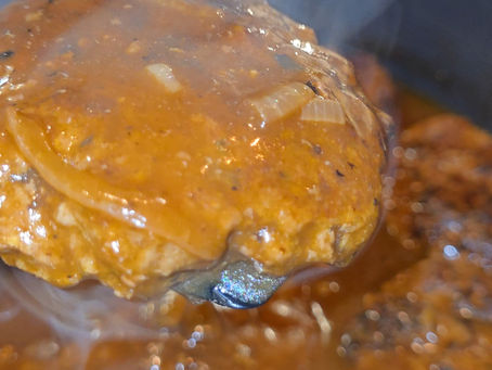 Savor the Comfort of Homemade Burger Steaks and Gravy with Mashed Potatoes