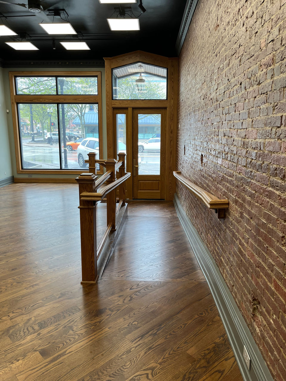 Byrd & Co. had a comprehensive interior transformation to create a modern and inviting atmosphere. A mid-1800's row building in downtown Wadsworth, OH. All hardwood, all custom made. The remodel focused on enhancing functionality, aesthetics, and overall employee experience.