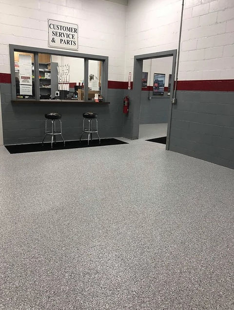 Gray epoxy flooring in a shop