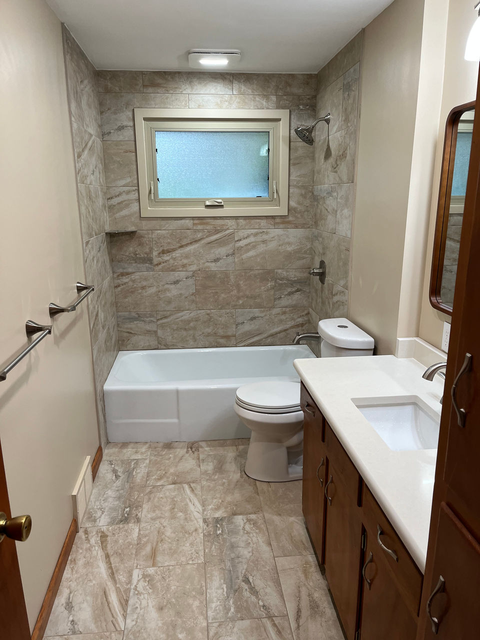 A complete overhaul of a bathroom space, including updates to fixtures, flooring, cabinetry, shower or tub, and overall layout. The goal is to create a refreshed and functional space.