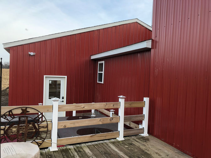 This family is expanding their spacious red-sided country home. Mud room addition with first floor laundry and attached 30' x 40' garage on an 1840's farmhouse. New additions will increase the overall living space and complement the existing property.