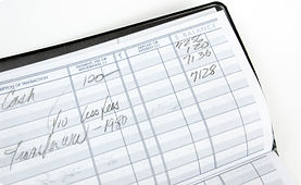 Checkbook register with financial entries