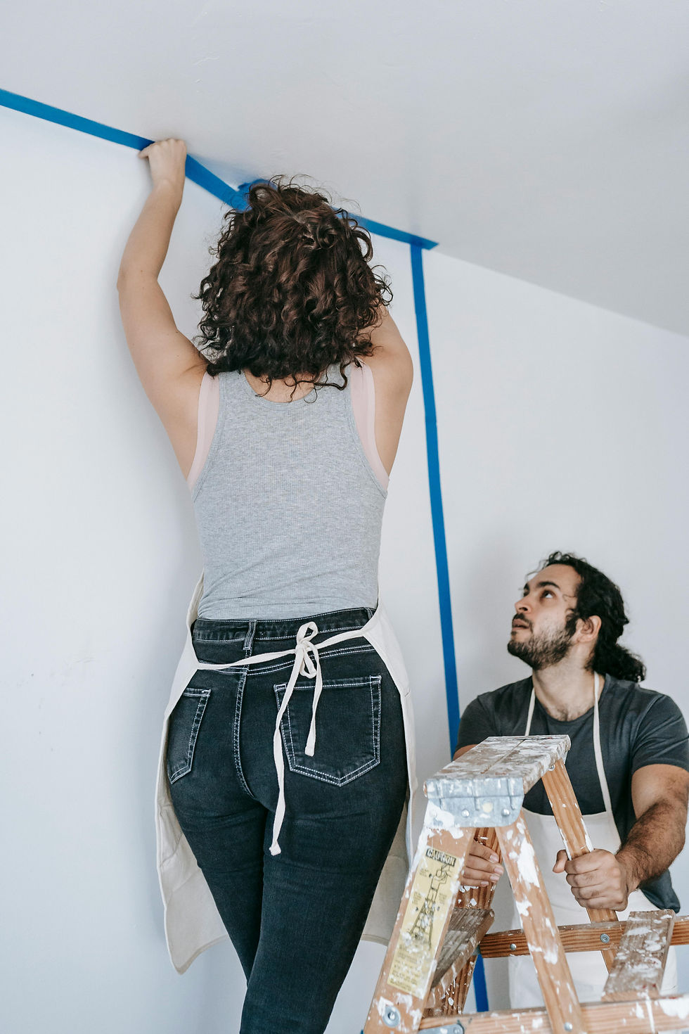 people fixing fixer upper
