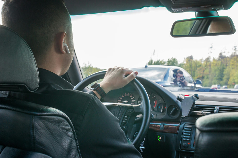 person driving with airpod