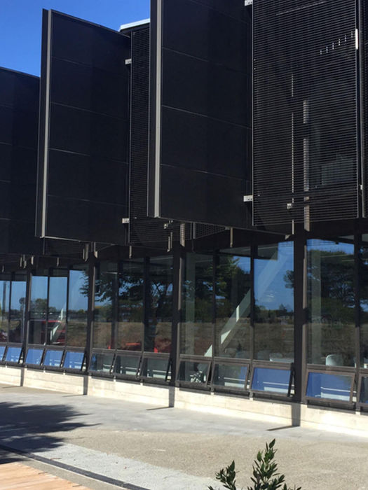 Custom aluminium shading screens installed on the exterior of the Ruataniwha Kaiapoi Civic Centre.