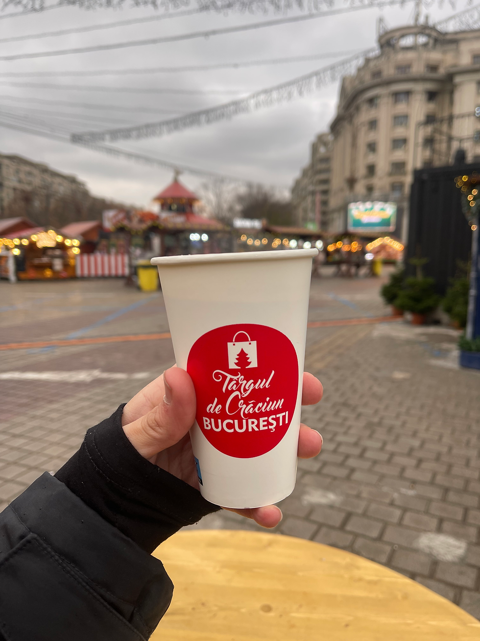 cup of hot cocoa at a christmas market in bucharest romania