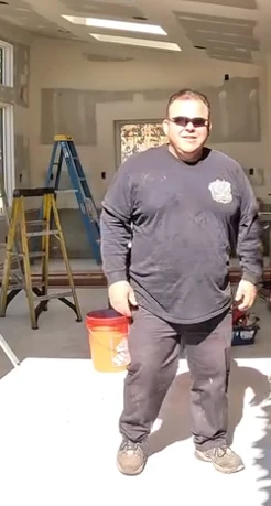 Alfredo Armienta on site at a garage door installation