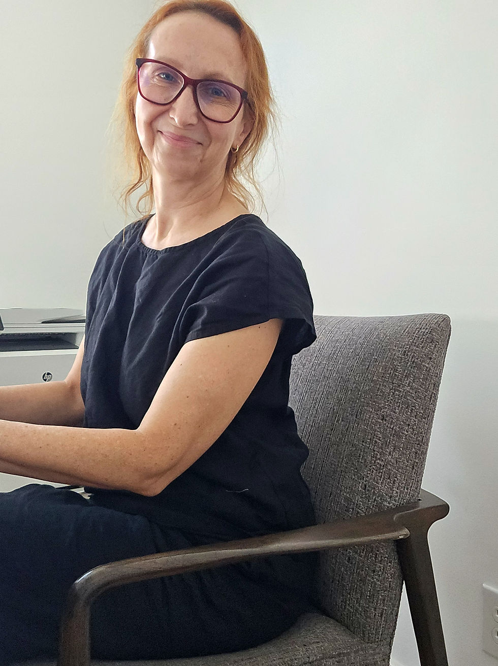 Zuzka in her midcentury modern 'office' chair