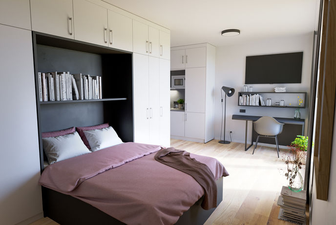 Business Apartment COZY Hamburg - Schlafbereich mit Doppelbett, Regal und Blick in den Wohnbereich
