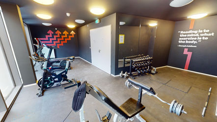 Open Living House Siegen - Fitnessraum mit Trainingsgeräten