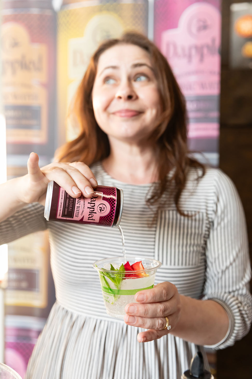 A can of dappled tonic being poured
