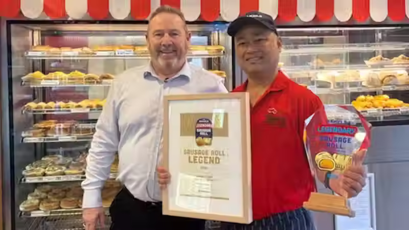 Dairy Flat Bakery's Bunnarith Sao was presented with the trophy for the best sausage roll in NZ.