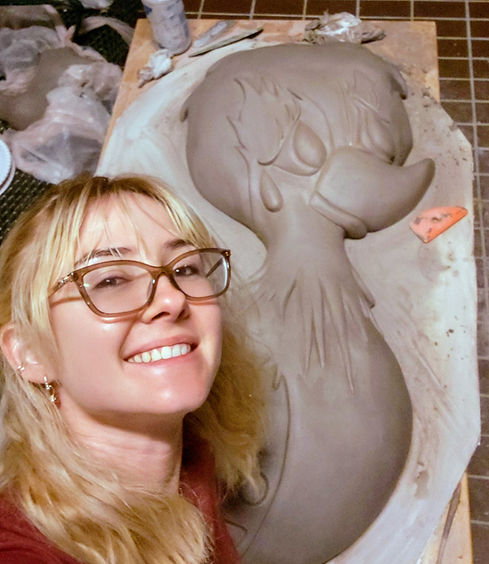 studio photo of artist with in progress duck sculpture
