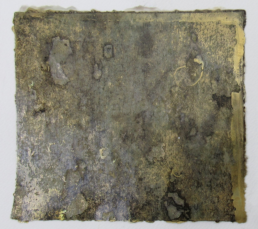 Dirty cleaning wipe painted with imitation gold