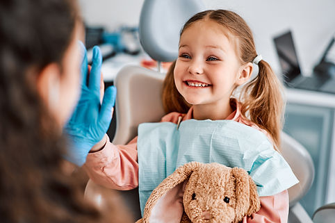 At the doctor's appointment. A candid emotional photo of a child sitting in a dental chair