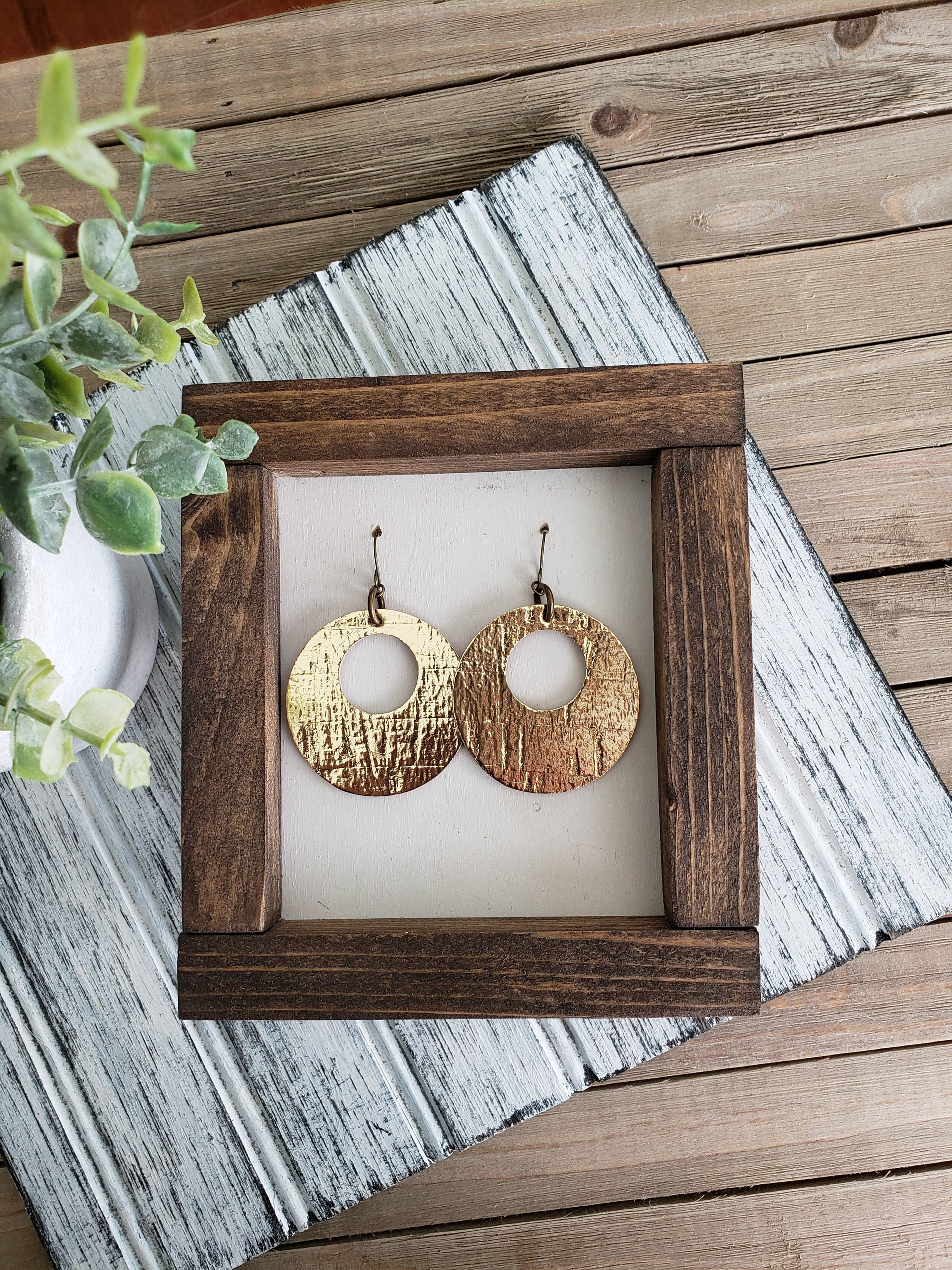 Metallic Gold Hole In One Leather Earrings