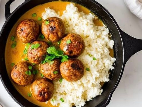 Spiced Meatballs in Coconut Curry over Cauliflower Rice