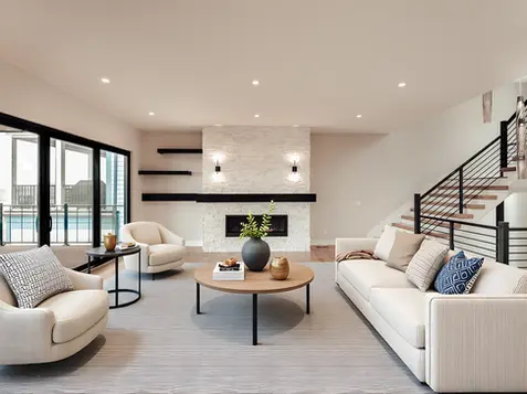 Luxury modern living room in Walworth Junction built by Frazier Homes featuring wide-plank hardwood flooring, custom stone fireplace, floating shelves, modern staircase, and expansive sliding glass doors.