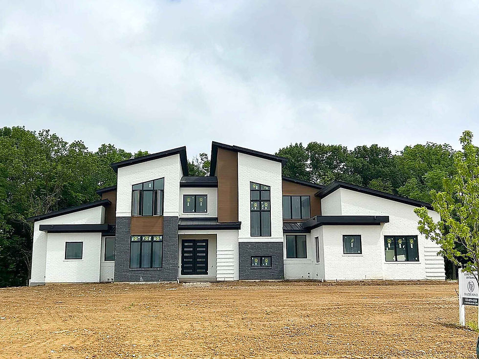 Modern custom home exterior by Frazier Homes showcasing completed elevation, rooflines, and window placement, illustrating key new construction do’s and don’ts.