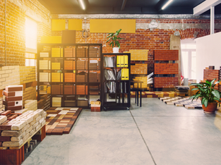 Exterior building material selections displayed in a design studio, illustrating Frazier Homes’ outside-in custom home building process that prevents selection fatigue and supports confident planning decisions.