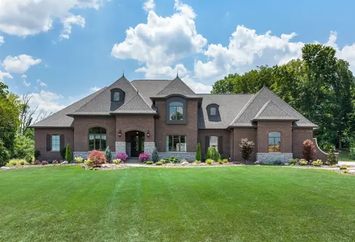Château Bellevue luxury custom home built by Frazier Homes, featuring elegant brick architecture, manicured landscaping, and exceptional craftsmanship in Cincinnati and Northern Kentucky.