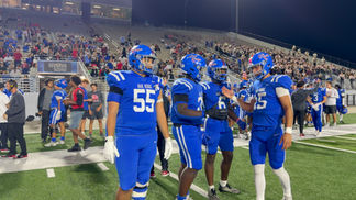 Captains Gather for Coin Toss Before Oak Ridge–Woodlands District Clash at Woodforest Bank Stadium