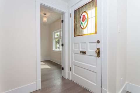 Beautifully preserved antique door with classic designs, adding a historical charm to the property.