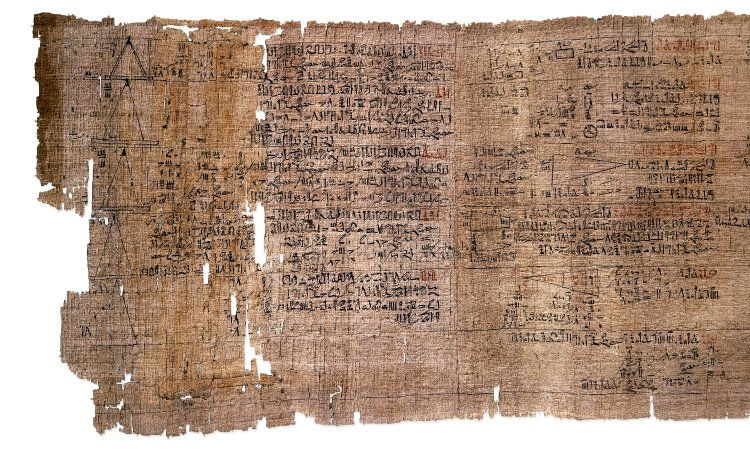 A very old piece of papyrus with ancient writing on it. The papyrus is frayed and has some holes.