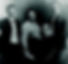 Photograph of Emmy and her three brothers. Emmy is in the middle of the photo and her brothers surround her.
