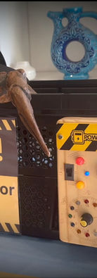 Dino Detector 3000 with T-Rex claw prop from The Crazy Scientist dinosaur STEM party.