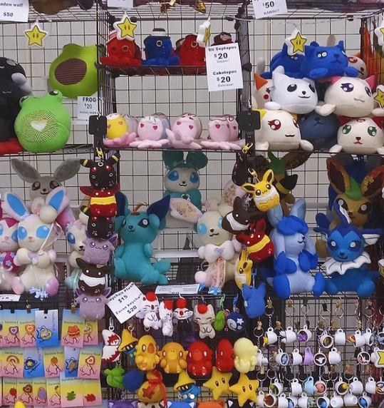 Starshine Plush Custom plush making, buttons & kawaii goods resin art artist alley chizu con 2024