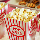 Popcorn in classic red and white striped boxes