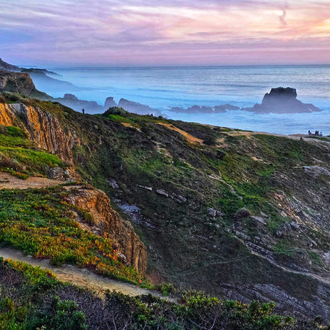 Coastal walk along rugged cliffs in Portugal